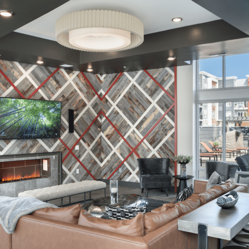 Amenity Lounge game room with shuffleboard and ample seating