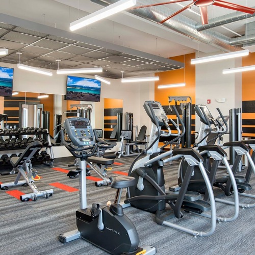 Fitness Center fitness center with ample equipment and in a large, spacious room