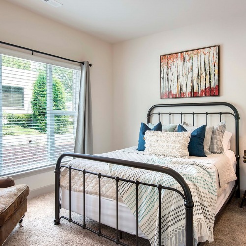 Large Windows bedroom with bright, natural lighting