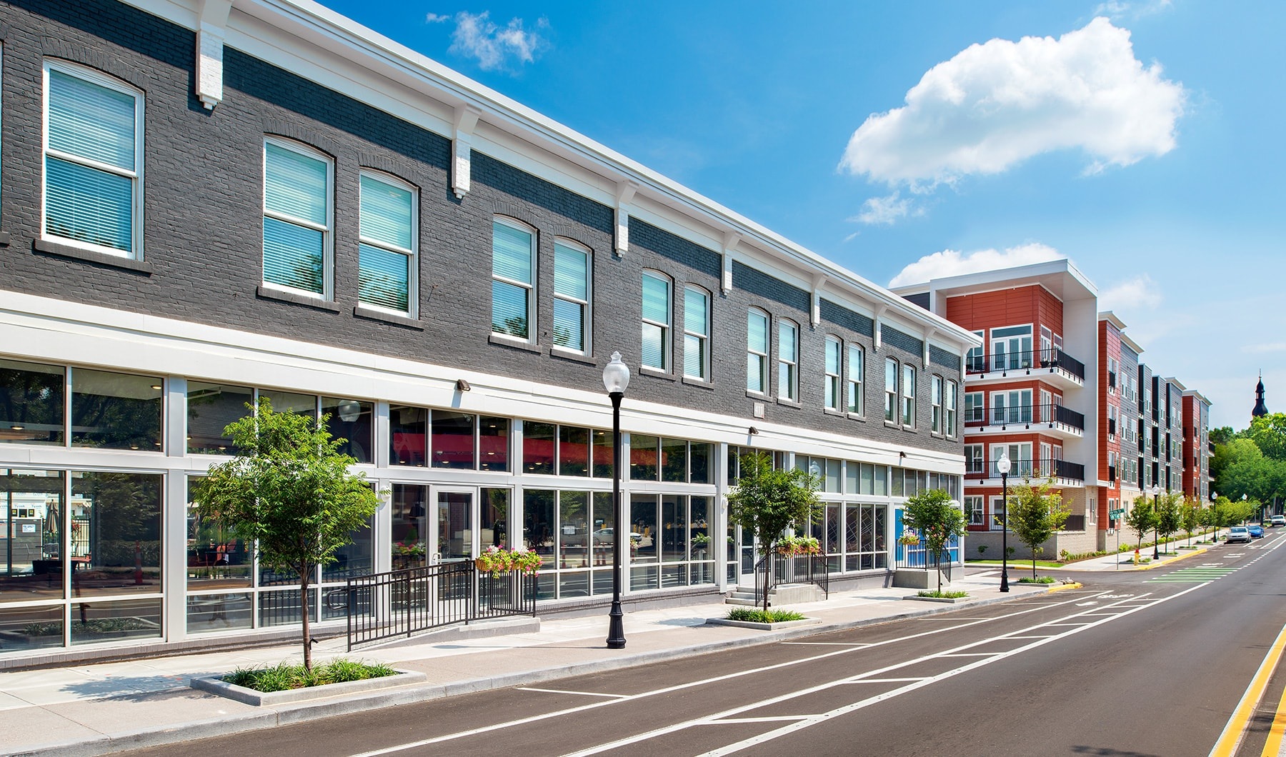 Urban Living. Luxury Lifestyle. street view of property showing spacious sidewalks